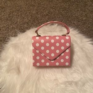 Pink and white polka dot purse